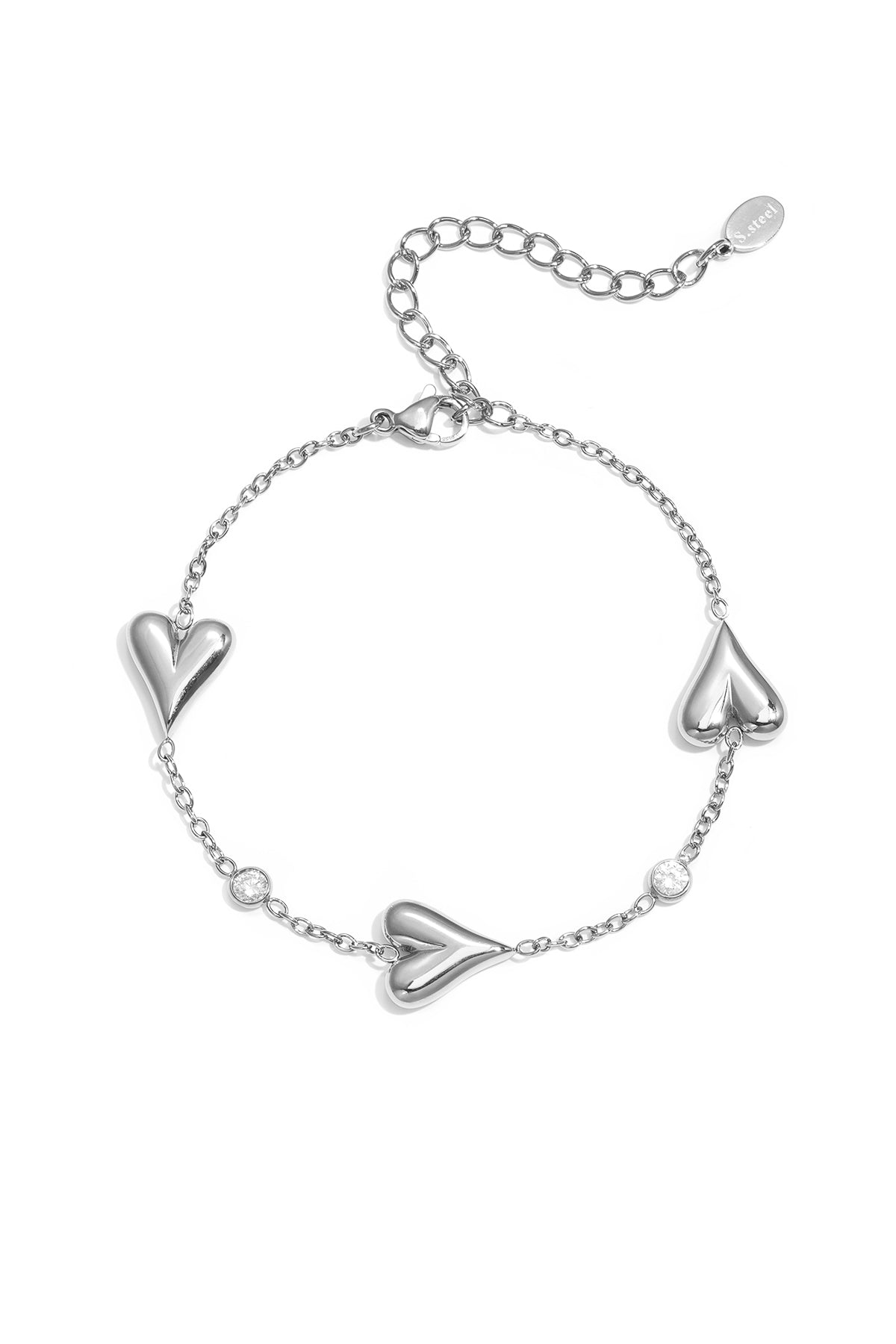 Bracciale con tre cuori massicci e pietre