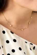 Collana con trifogli e pietre rotonde di zirconi cubici
