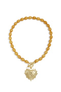 Collana di perline con ciondolo di chiusura frontale