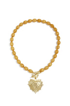 Collana di perline con ciondolo di chiusura frontale