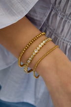 Bracciale rigido con pietre rotonde