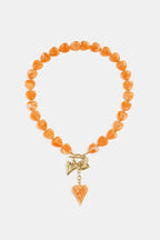 Collana di perline con ciondoli a forma di cuore pendenti